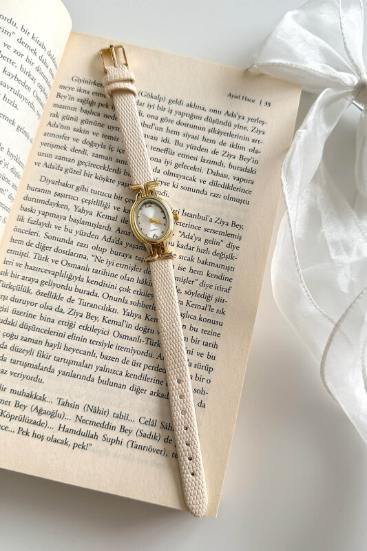 Coco Bej Beyaz Yuvarlak Kadran Deri Dokulu Kordon Kadın Kol Saati - 1