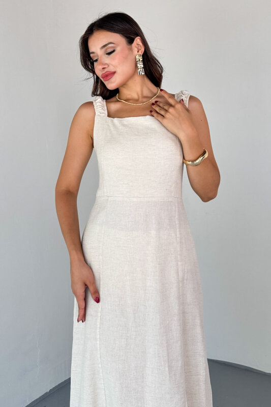 ELB-01824 Taş Rengi Yırtmaç Detaylı Sırtı Çapraz Bağlamalı Keten Elbise - 3