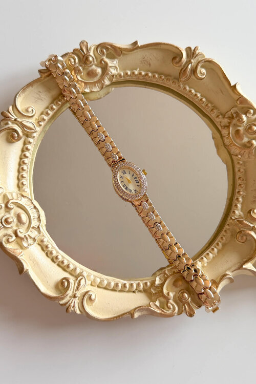 Mely Oval Taşlı Kadran Gold Çelik Kordon Kadın Kol Saati