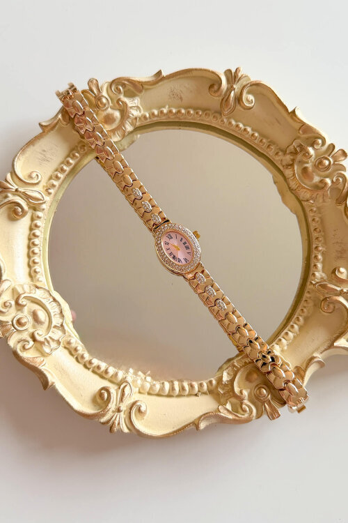 Mely Oval Taşlı Pudra Kadran Gold Çelik Kordon Kadın Kol Saati 