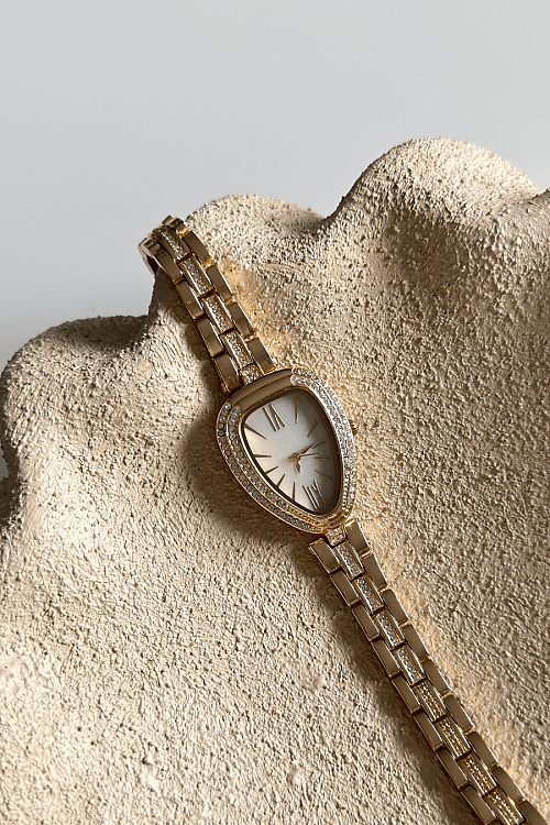 Zorel Beyaz Taşlı Damla Kadran Özel Tasarım Gold Çelik Kordon Kadın Kol Saati